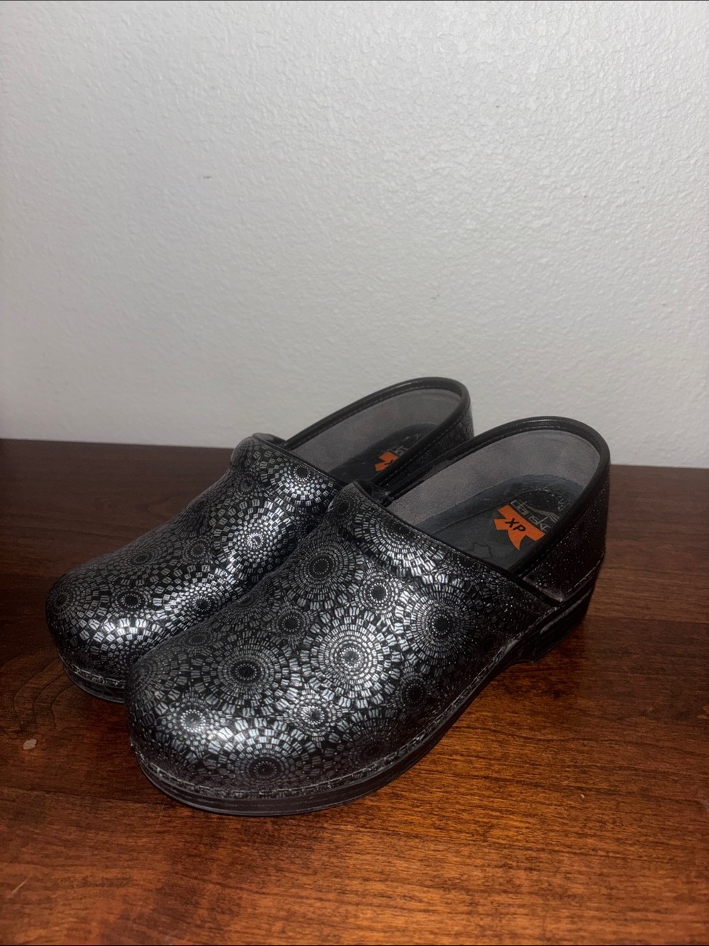 Dansko Black Metallic Patterned Clogs